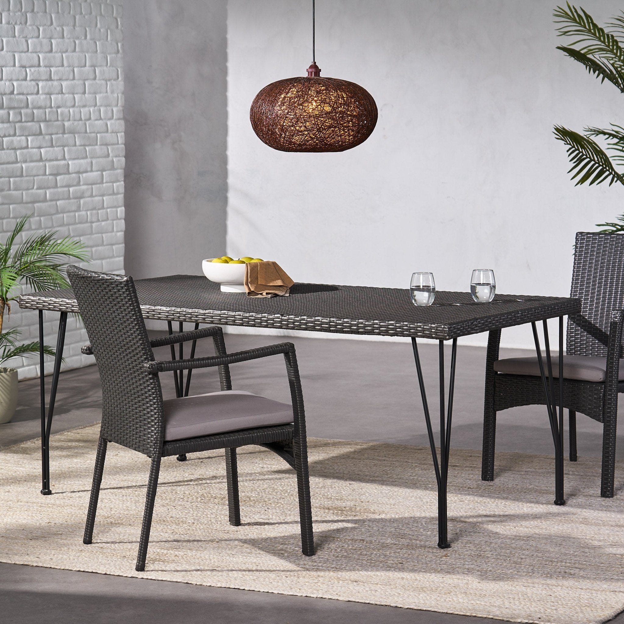 Outdoor Dining Table with Rattan Cover and Metal Legs Pier 1